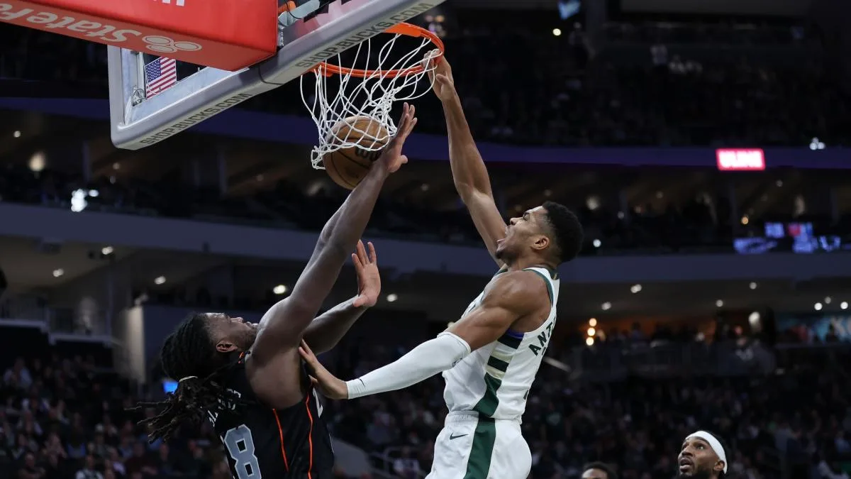 Watch Giannis Antetokounmpo get ejected after poster dunk USREPORT